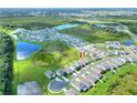 Community overview showing a neighborhood with various houses and green spaces at 2638 Galway Grove Way, Lakeland, FL 33811