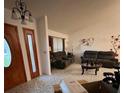 Bright living room with tiled floors and comfortable seating at 804 Mountbatten Ln, Kissimmee, FL 34758