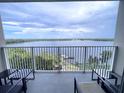 Balcony with lake and pool view at 13415 Blue Heron Beach Dr # 808, Orlando, FL 32821