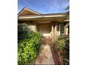 Front entrance with stone detailing and double doors at 4422 Meadowood St, Orlando, FL 32812