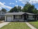 House exterior showcasing a renovated facade at 2721 Woodland Hills Ave, Lakeland, FL 33803