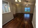 Living room featuring hardwood floors and a view to the front yard at 6059 Magpie Dr, Lakeland, FL 33809