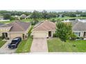 Aerial view of house, showcasing the backyard and neighborhood at 4814 Rockvale Dr, Kissimmee, FL 34758