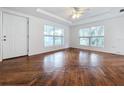 Living room with hardwood floors and large windows at 1010 Martin Luther King Jr Blvd, Bartow, FL 33830