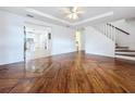 Spacious living room with hardwood floors and views of the kitchen at 1010 Martin Luther King Jr Blvd, Bartow, FL 33830