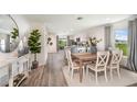 Farmhouse style dining room with wooden table and chairs at 1258 Chester Ave, Haines City, FL 33844