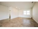 Spacious living room with tile flooring and neutral color palette at 802 Fraser Dr, Poinciana, FL 34759