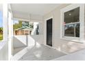 Inviting front porch, perfect for relaxing and enjoying the outdoors at 4251 Tangerine Ave, Sanford, FL 32773