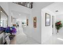 Elegant entryway with high ceilings and views into the living area at 791 Terrapin Dr, Debary, FL 32713