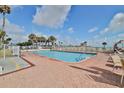 Inviting rectangular pool with surrounding patio and ocean views at 935 S Atlantic Ave # 264, Daytona Beach, FL 32118