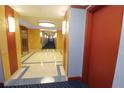 Building hallway with modern flooring and lighting at 231 Riverside Dr # 1106-1, Holly Hill, FL 32117