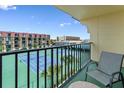 Balcony view overlooking tennis courts and ocean at 1433 N Atlantic Ave # 422, Daytona Beach, FL 32118