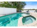 Relaxing pool and spa with a patio, perfect for entertaining at 3120 John Anderson Dr, Ormond Beach, FL 32176