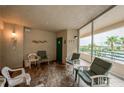 Spacious enclosed patio with comfortable seating at 4575 S Atlantic Ave # 6310, Port Orange, FL 32127