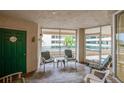 Enclosed patio with seating and large windows at 4575 S Atlantic Ave # 6310, Port Orange, FL 32127