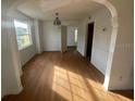Bright dining room with hardwood floors and chandelier at 820 N Oleander Ave, Daytona Beach, FL 32118