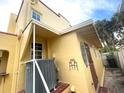 Rear exterior showing AC unit and access door at 820 N Oleander Ave, Daytona Beach, FL 32118