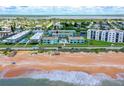 Aerial view of beach condo community near ocean at 2850 Ocean Shore Blvd # 15C, Ormond Beach, FL 32176