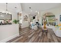 Spacious living room featuring hardwood floors and abundant natural light at 1273 Sunningdale Ln, Ormond Beach, FL 32174