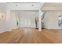 Bright and spacious entryway with hardwood floors and staircase at 12245 Park Ave, Windermere, FL 34786