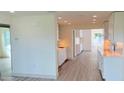 Modern kitchen with white cabinets and light floors at 54 Palmetto Dr, Ormond Beach, FL 32176