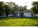Gray house with a large front yard at 809 Maley St, Daytona Beach, FL 32114
