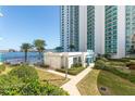 Complex with a pool and walkways near the waterfront at 231 Riverside Dr # 1904, Daytona Beach, FL 32117