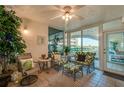 Bright sunroom with comfy seating and ocean views at 4555 S Atlantic Ave # 4304, Ponce Inlet, FL 32127
