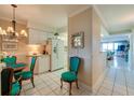 Bright kitchen with breakfast nook and white cabinets at 4565 S Atlantic Ave # 5308, Port Orange, FL 32127