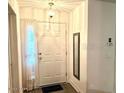 Bright entryway with mirror and coat closet at 129 Blue Heron Dr # A, Daytona Beach, FL 32119