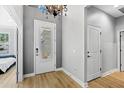 Bright entryway with wood floors and access to other rooms at 374 Lost Shaker Way, Daytona Beach, FL 32124