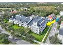 Aerial view showcasing building location and landscaping at 280 Celebration Blvd # 203, Celebration, FL 34747