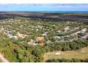 Aerial view showing home's location in a community near a golf course at 1113 Athlone Way, Ormond Beach, FL 32174