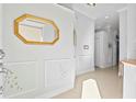 Bright entryway with decorative wall accents and a large mirror at 1333 Asher Ct # 1333, Ormond Beach, FL 32174