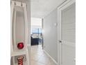 Condo entryway, showing a coat rack and access to living space at 2700 Ocean Shore Blvd # 508, Ormond Beach, FL 32176