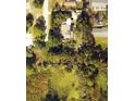 Aerial view showing house and surrounding lot at 912 Holiday Ln, Leesburg, FL 34748