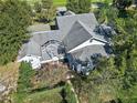 House with screened patio and large backyard at 123 N Ingraham Ave, Tavares, FL 32778