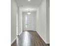 Bright and spacious entryway with wood-look tile flooring at 429 Silver Palm Dr, Haines City, FL 33844