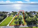 Aerial view of waterfront property with large lot and home at 12730 E Highway 25, Ocklawaha, FL 32179