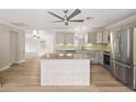 Modern kitchen with stainless steel appliances and an island at 21342 S Buckhill Rd, Clermont, FL 34715