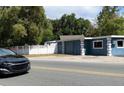 Exterior view of a blue commercial building near a road at 1501 N Cr 19A, Eustis, FL 32726