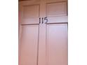 Simple and modern front door of unit 115 at 1100 E Caroline St # 115, Tavares, FL 32778