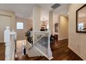 View of a staircase leading down to the entry at 33 Camino Real # 303, Howey In The Hills, FL 34737