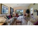 Spacious living room with comfortable seating and golf course view at 23 Camino Real Blvd # 23, Howey In The Hills, FL 34737