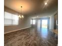 Dining room features tile floors and access to backyard at 2003 Sunshine Peak Dr, Minneola, FL 34715