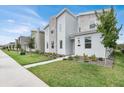 Modern home with stone and light colored exterior at 4189 Paragraph Dr, Kissimmee, FL 34746