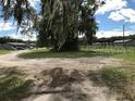 Multiple small houses and a grassy area at 1605 Rose Ln, Eustis, FL 32726