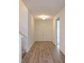 Bright and spacious entryway with tile flooring and double doors at 2368 Juniper Berry Dr, Minneola, FL 34715