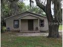 Single story home with covered porch at 1603 Rose Ln, Eustis, FL 32726