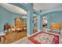 Formal dining room with wooden table and hardwood floors at 3914 Scarborough Ct, Clermont, FL 34711